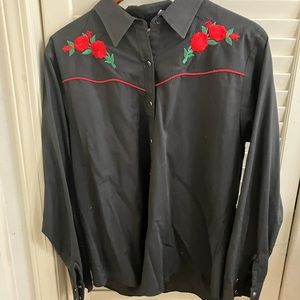 Pearl snap shirt, worn a couple times. Freshly dry cleaned.